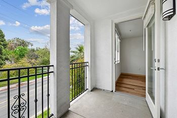 Balcony with railing at Parkview Living Apartments, Los Angeles, California, 90026