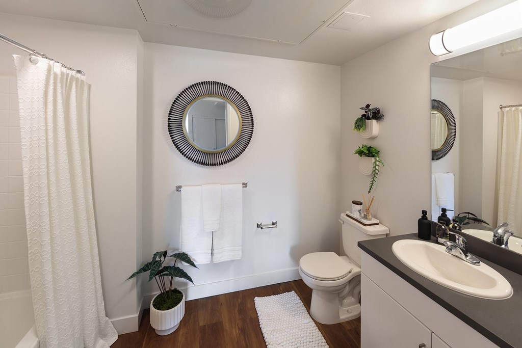 Bathroom with mirror at Sora Apartments, Inglewood, CA