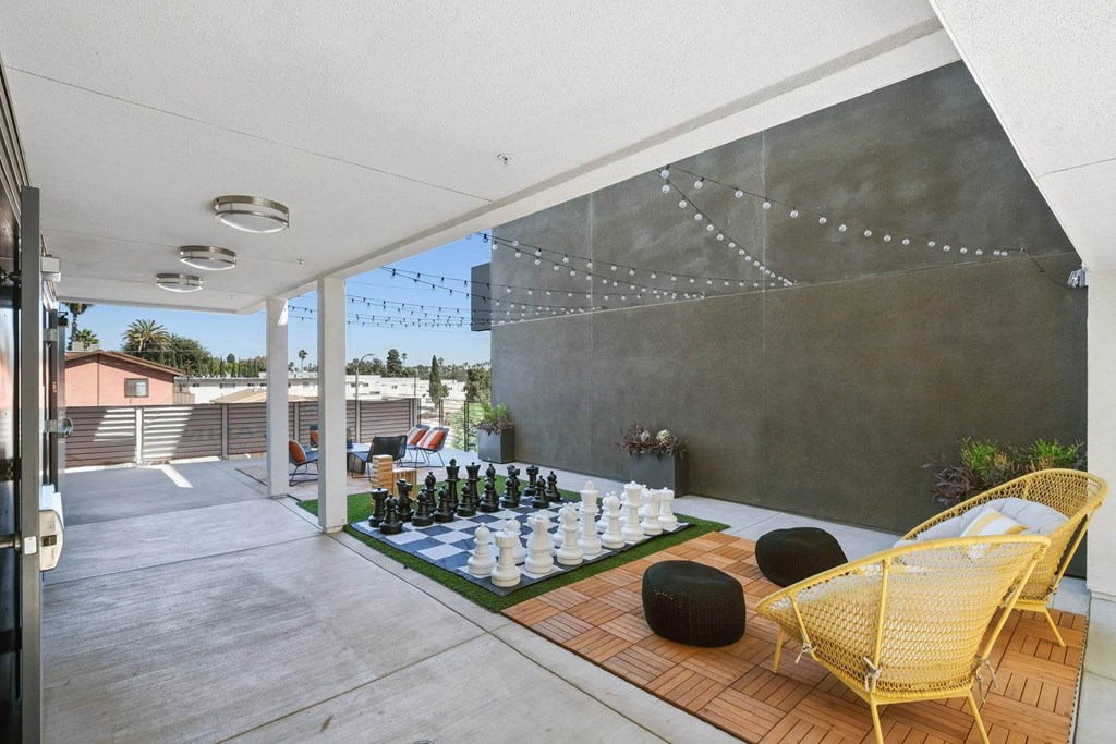 Social area with large chess board at Sora Apartments, Inglewood, California, 90302