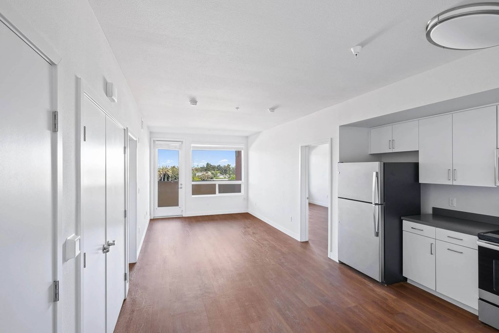 Kitchen with white cabinets at Sora Apartments, Inglewood, 90302