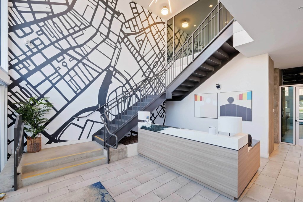 Staircase with painted wall at Sora Apartments, California, 90302
