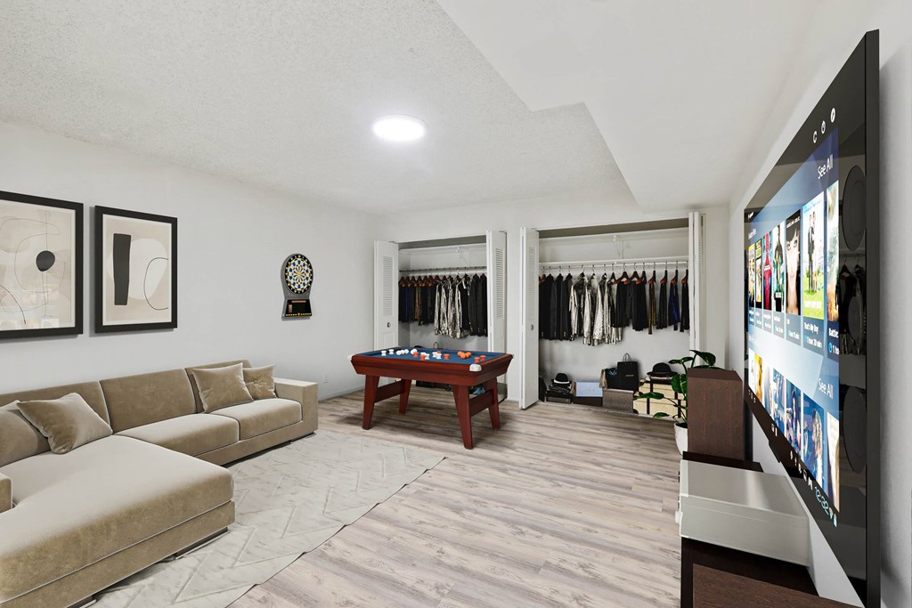 Living room with a TV at Vistas of Annandale, Annandale, 22003