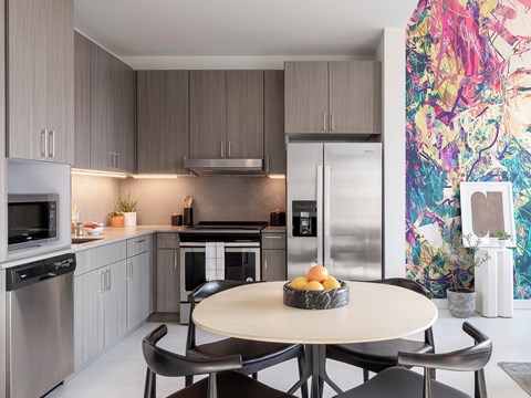 Kitchen with cabinets at Lofts at Centennial Yards, Atlanta, GA, 30303