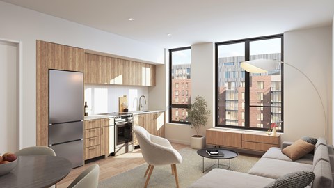 A modern kitchen with a dining table and chairs.