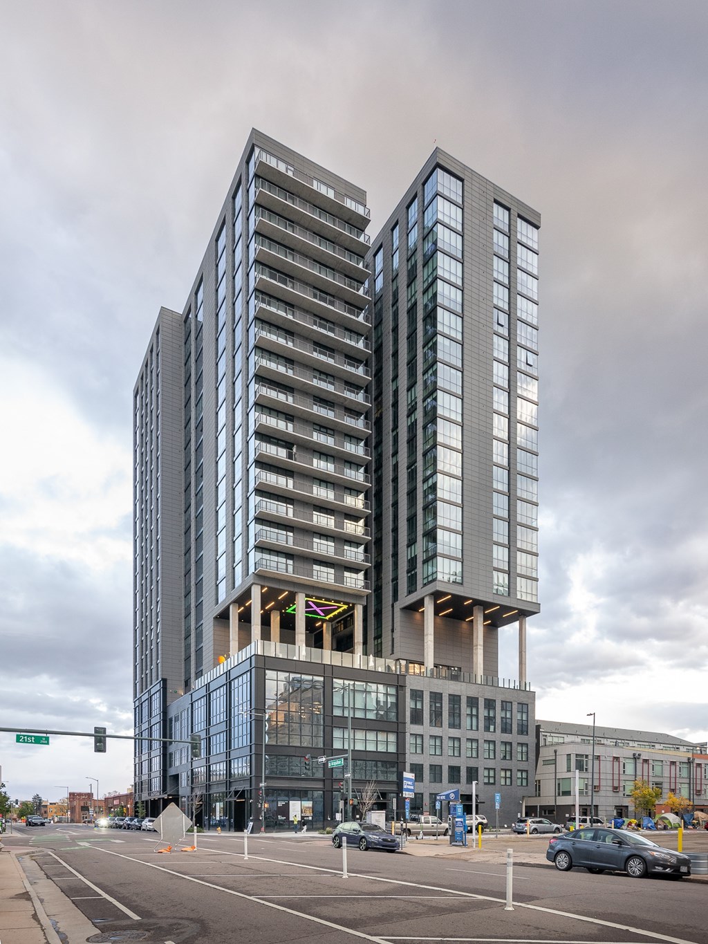 Modern glass building at Velaris Living Apartments, Colorado