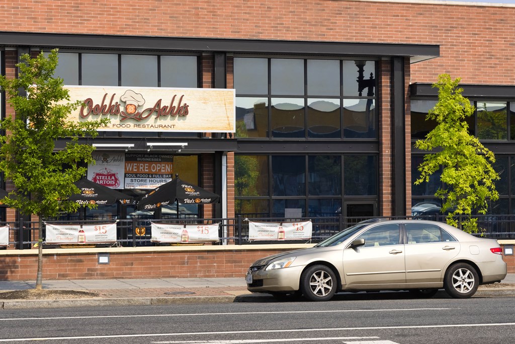 A car is parked in front of a restaurant.at The Vale at the Parks, Washington  