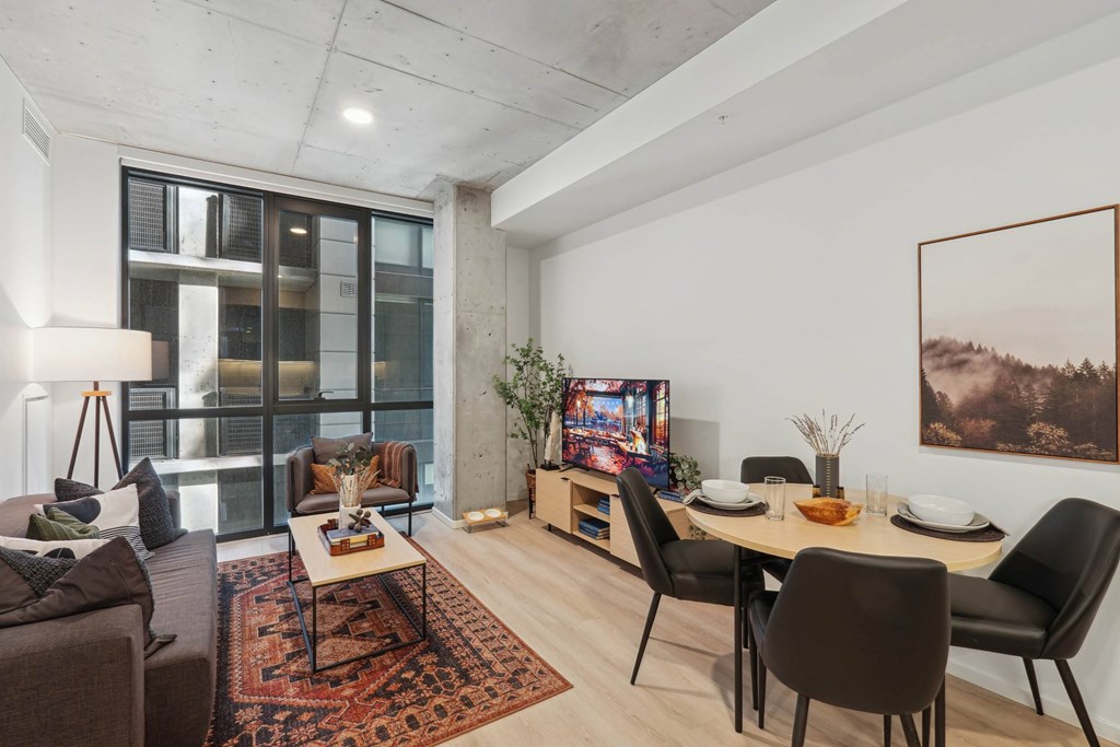 Living room with Dining table at Velaris Living Apartments, Denver, CO, 80205