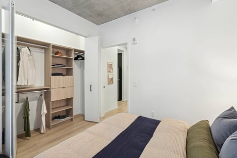 Bedroom with closet at Velaris Living Apartments, Denver, CO, 80205