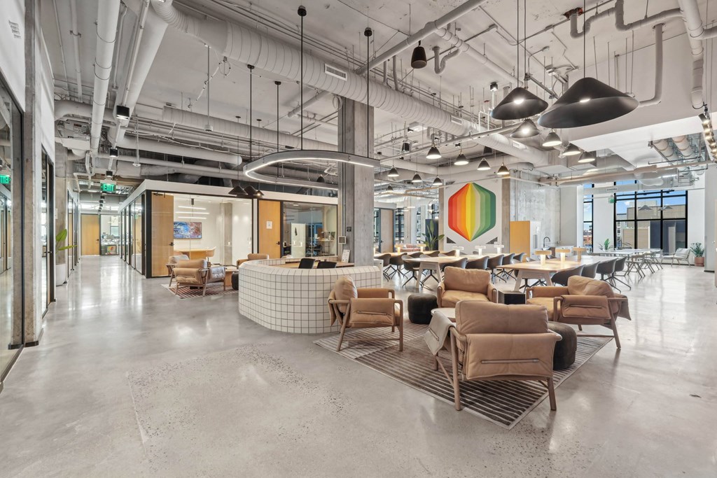 Common area with comfortable chairs at Velaris Living Apartments, Denver, CO, 80205