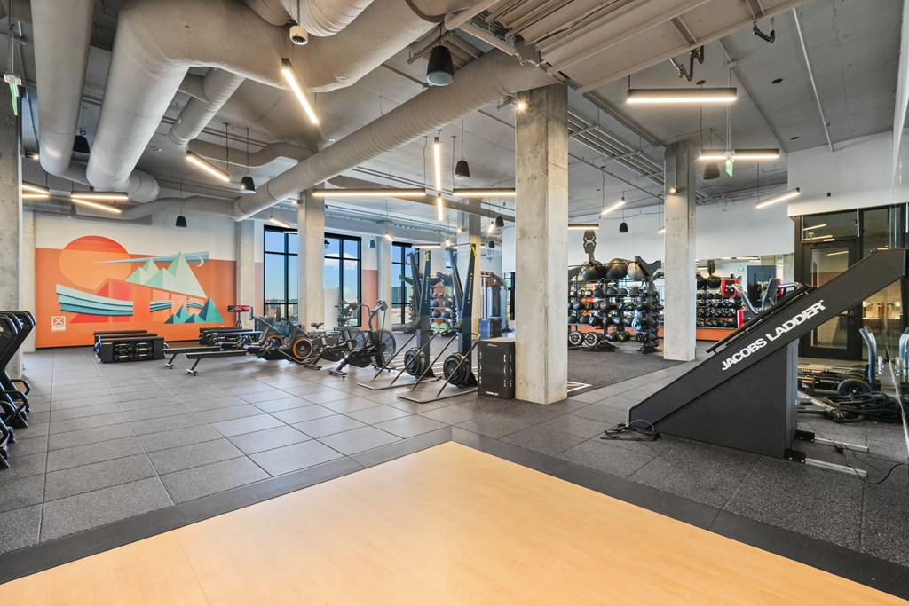 Fitness center with variety of equipments at Velaris Living Apartments, Denver, CO