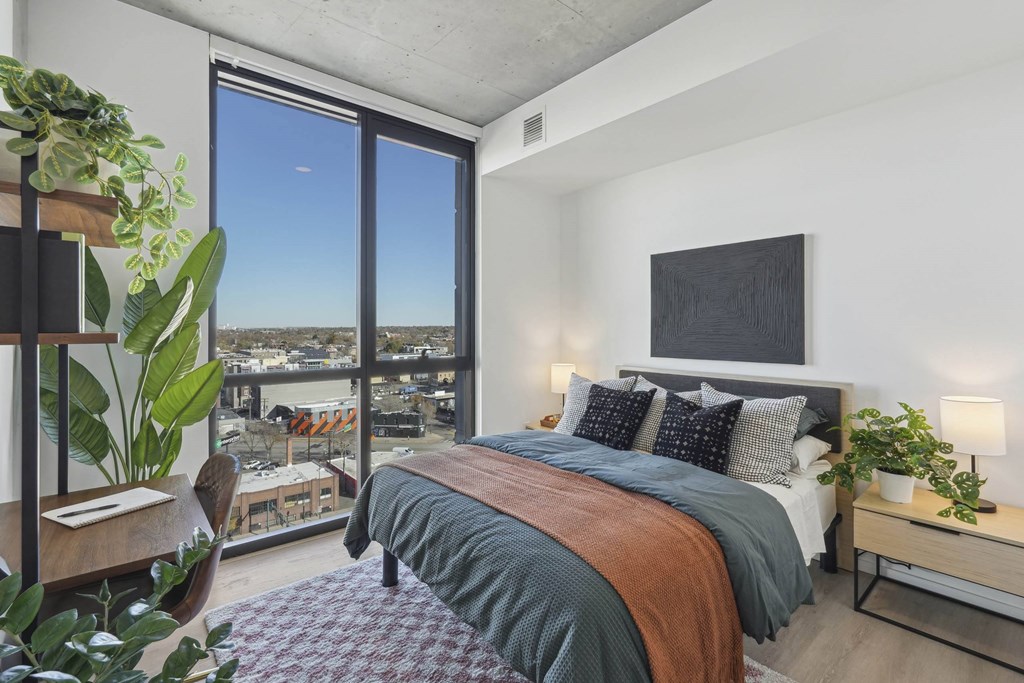 Bedroom with a comfortable bed at Velaris Living Apartments, Colorado, 80205