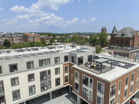A view of a city from a high angle with buildings and a clear sky, 28 Austin, Newton, Massachusetts