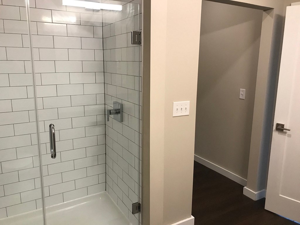 Tiled shower in the bathroom at the lofts at narrow in west reading pa
