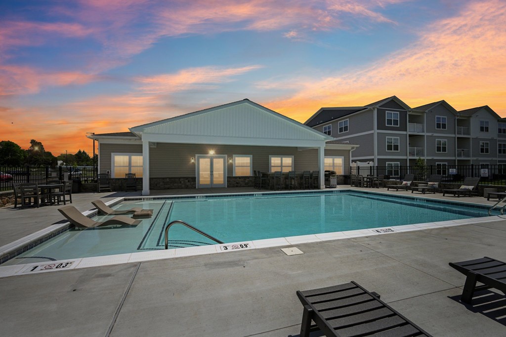 Poolside with a twilight sky at The Reserve at Iroquois