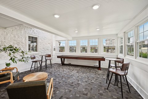 Sunroom with Shuffleboard Business Center at The Reserve at Gring's Mill