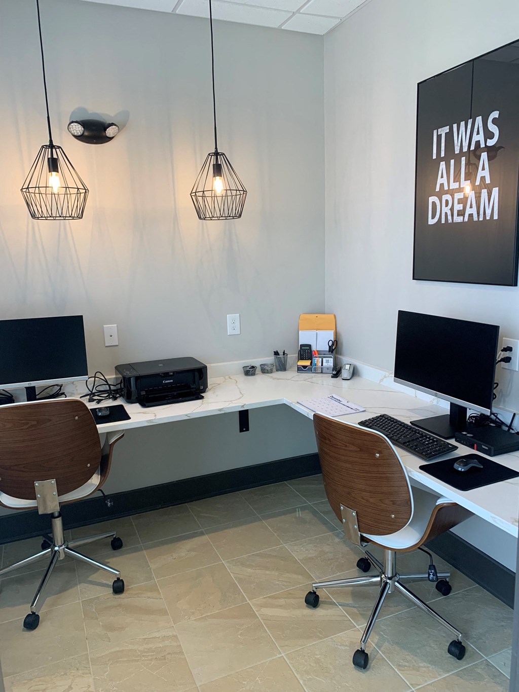 Business center chairs and computers at the reserve at rivers edge