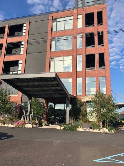Front entrance of large apartment building, the lofts at narrow in west reading pa