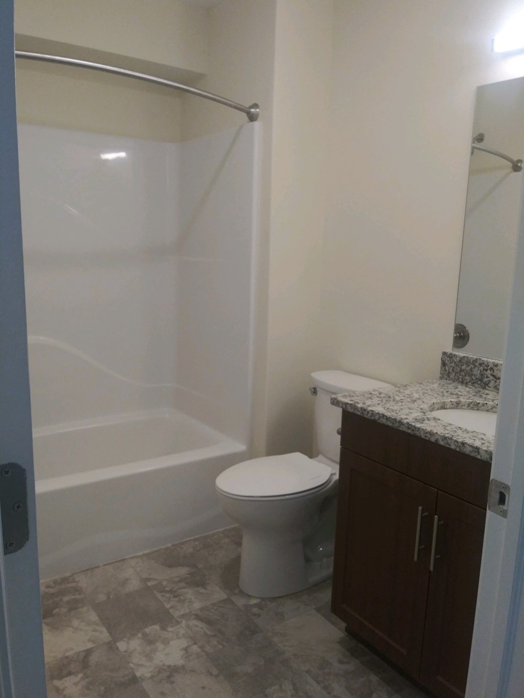 Apartment bathroom with full bathtub at the reserve at rivers edge
