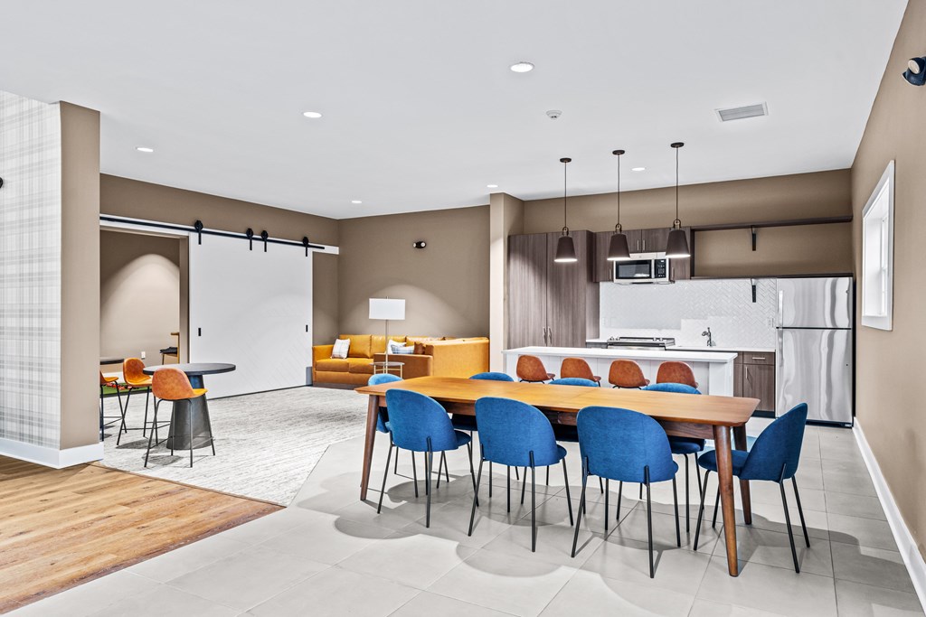 Community Kitchenette, Dining Area, Lounge and Golf Simulator Room at The Reserve at Palmer Pointe