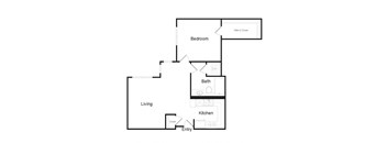 A floor plan of a home with a living room, kitchen, bedroom, bathroom and walk-in closet.