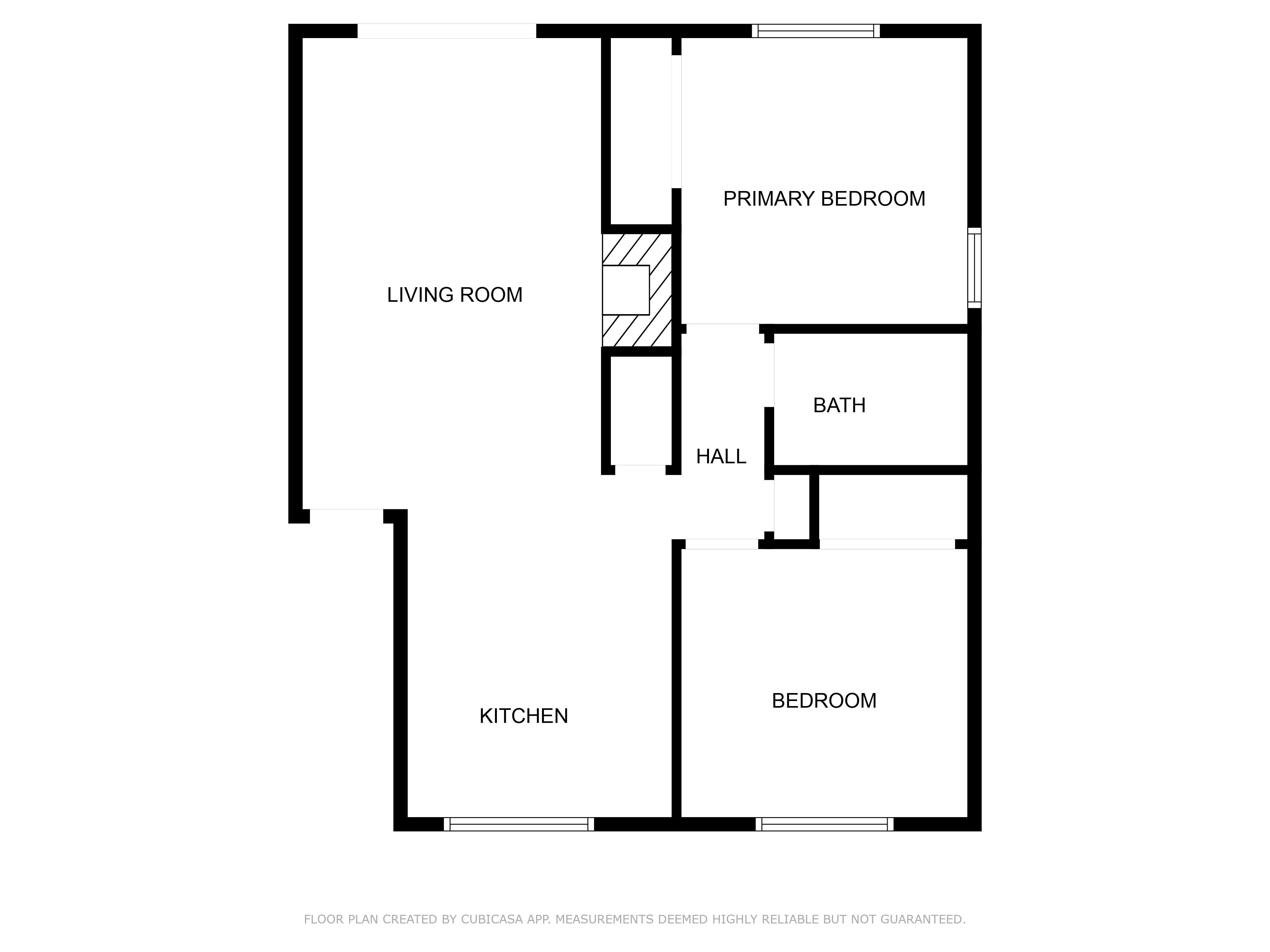 A floor plan of a house with a living room, kitchen, bath, hall, bedroom and primary bedroom.