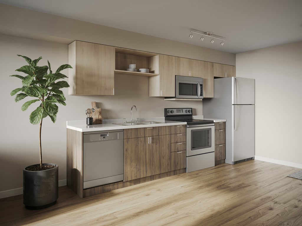 A modern kitchen with wooden cabinets and stainless steel appliances.
