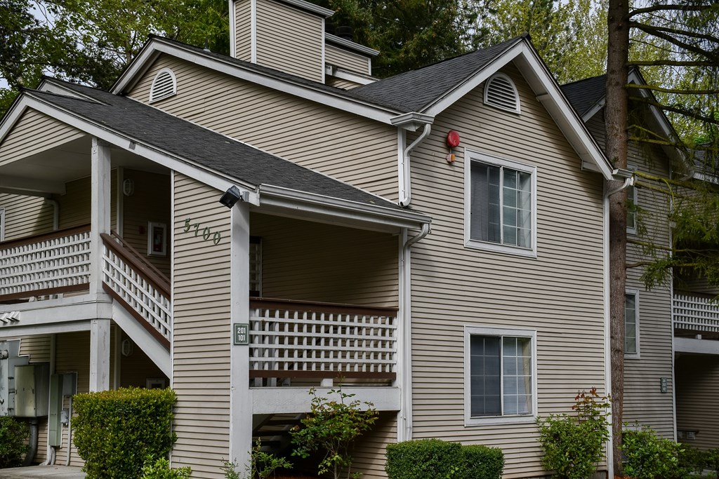 A house with a balcony and a window.