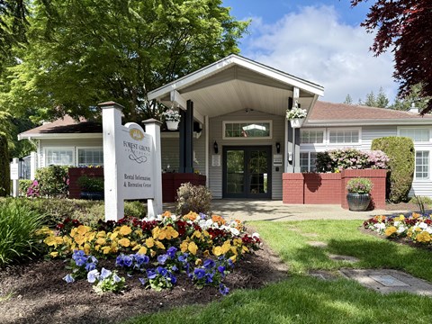 The front of a building with a sign that says Forest Grove.