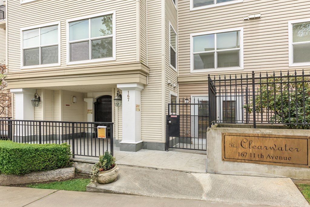 The front of a building with a sign that says "The Clearwater" on it.