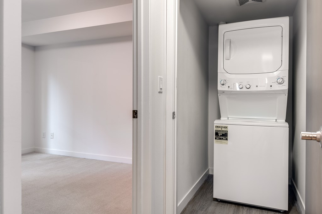 A white oven is in a small room.
