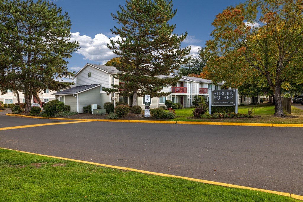 Auburn Square is a residential complex with a sign in front.