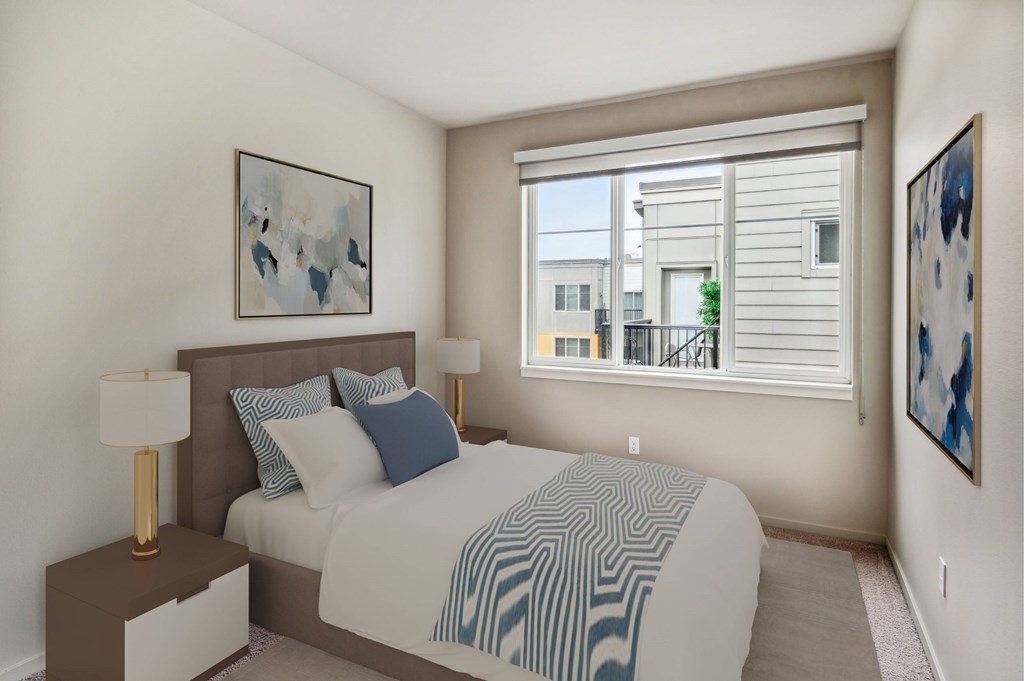 A bedroom with a bed, nightstand, and two lamps.