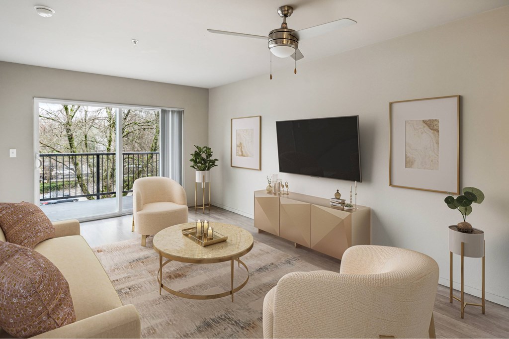 A living room with a flat screen TV mounted on the wall.