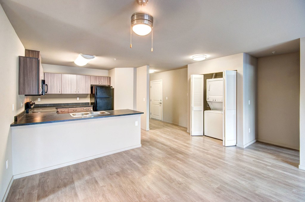 A kitchen with a counter and cabinets is shown.
