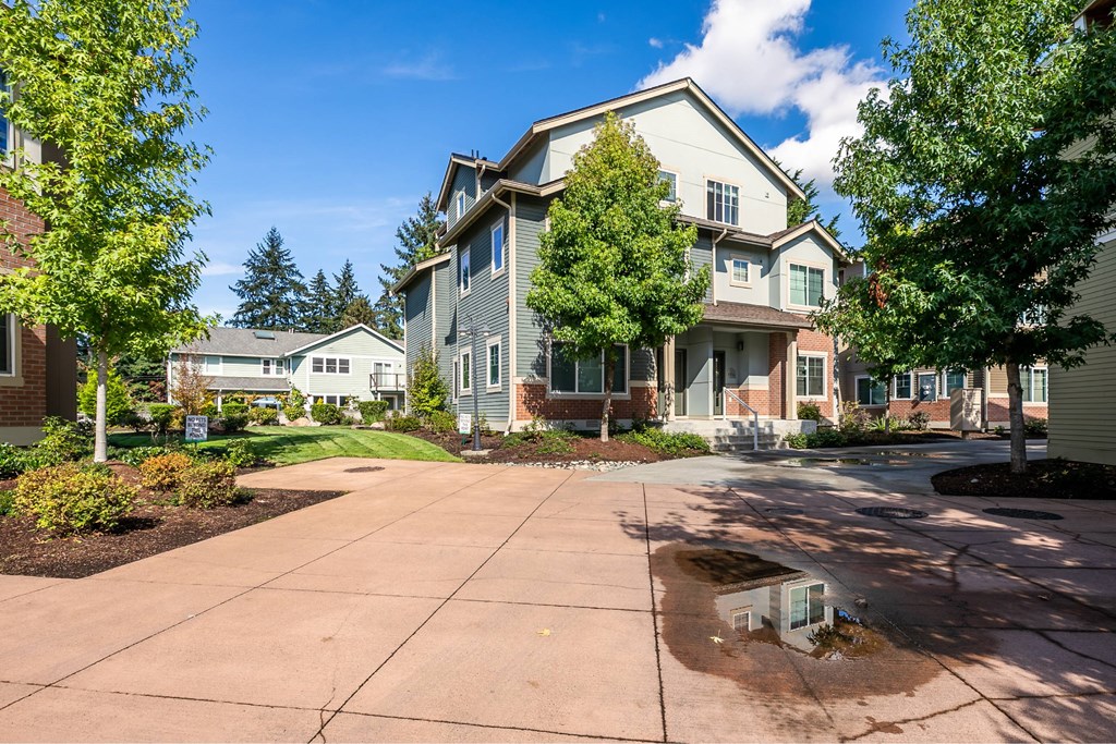 A residential area with houses and trees.