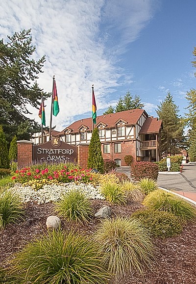 The image shows a building with the name "Stratford" on a sign in front of it.