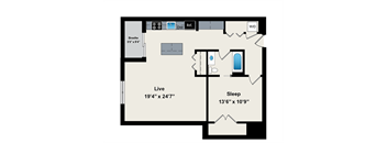 A floor plan of a room with a living area, sleeping area, and bathroom.