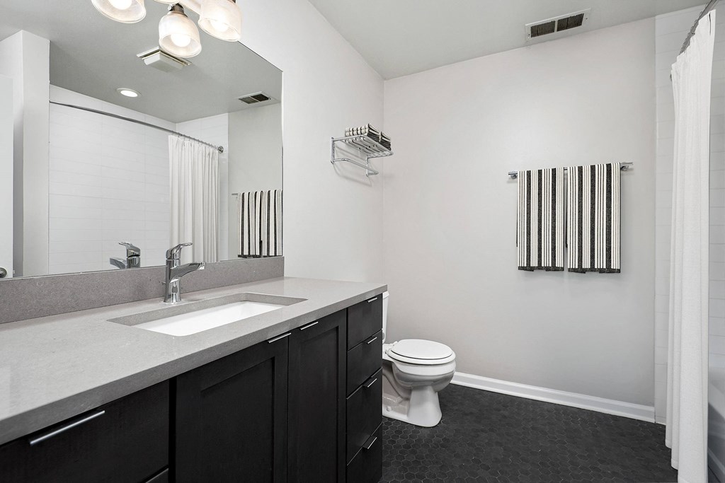 a bathroom with a sink and a toilet