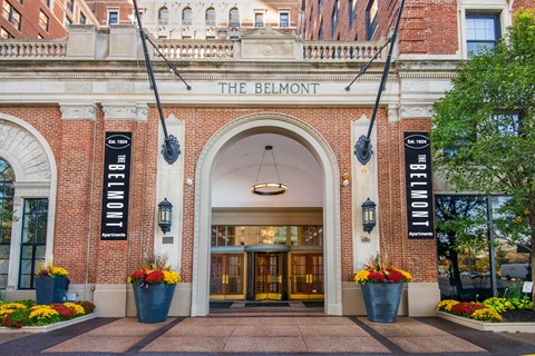 the bellmont hotel entrance in front of a brick building