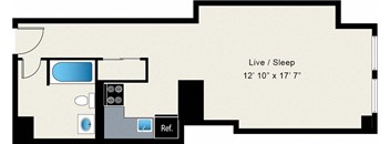 A floor plan of a room with a bed, a desk, and a television.
