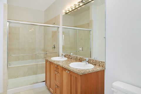 a bathroom with a sink and a shower