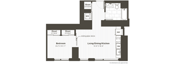 A floor plan of a small apartment with a bedroom, living/dining/kitchen area, and a bathroom.