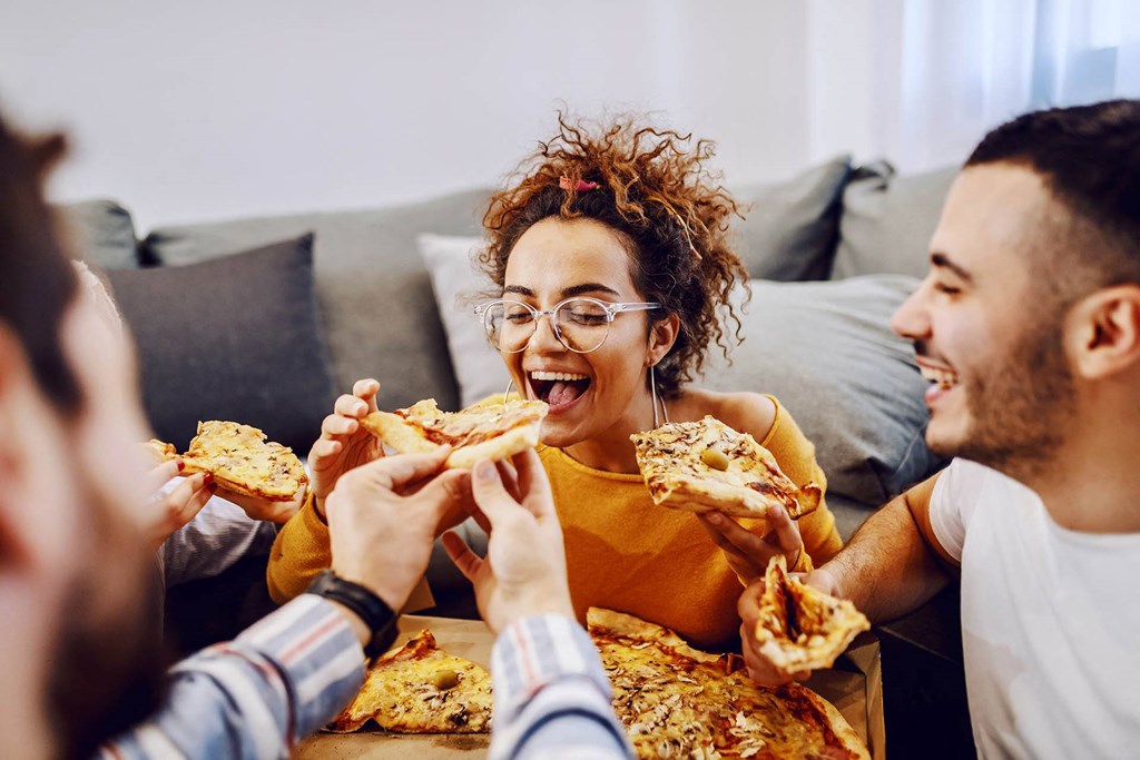 A group of people enjoying a meal together.
