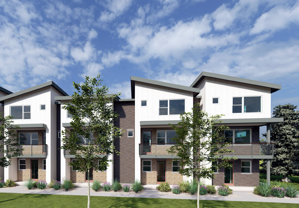 A modern three-story apartment building with balconies and a landscaped front yard.