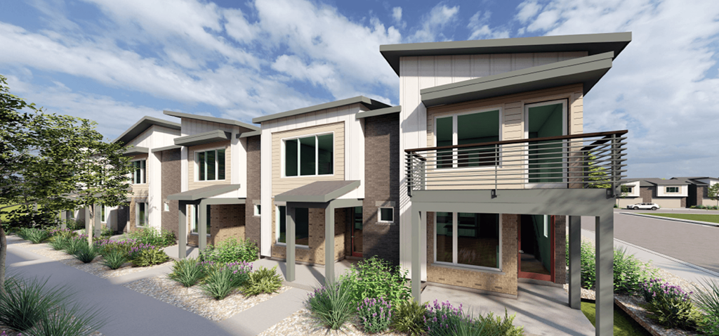A row of modern houses with a driveway in between.
