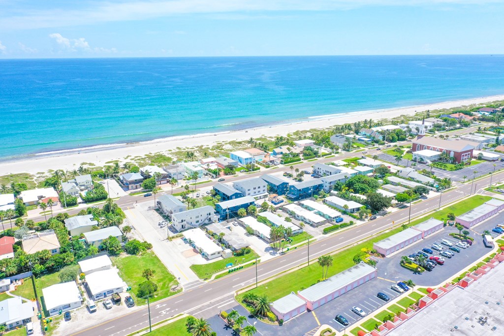 A beachfront community with a road running through it.