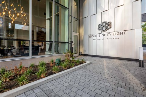 The front of a building with the name Eight Eighty Eight on it.
