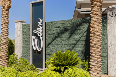 A building with a sign that says "Ebony" in front of it.