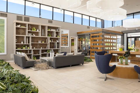 A modern living room with a large window and a variety of furniture.