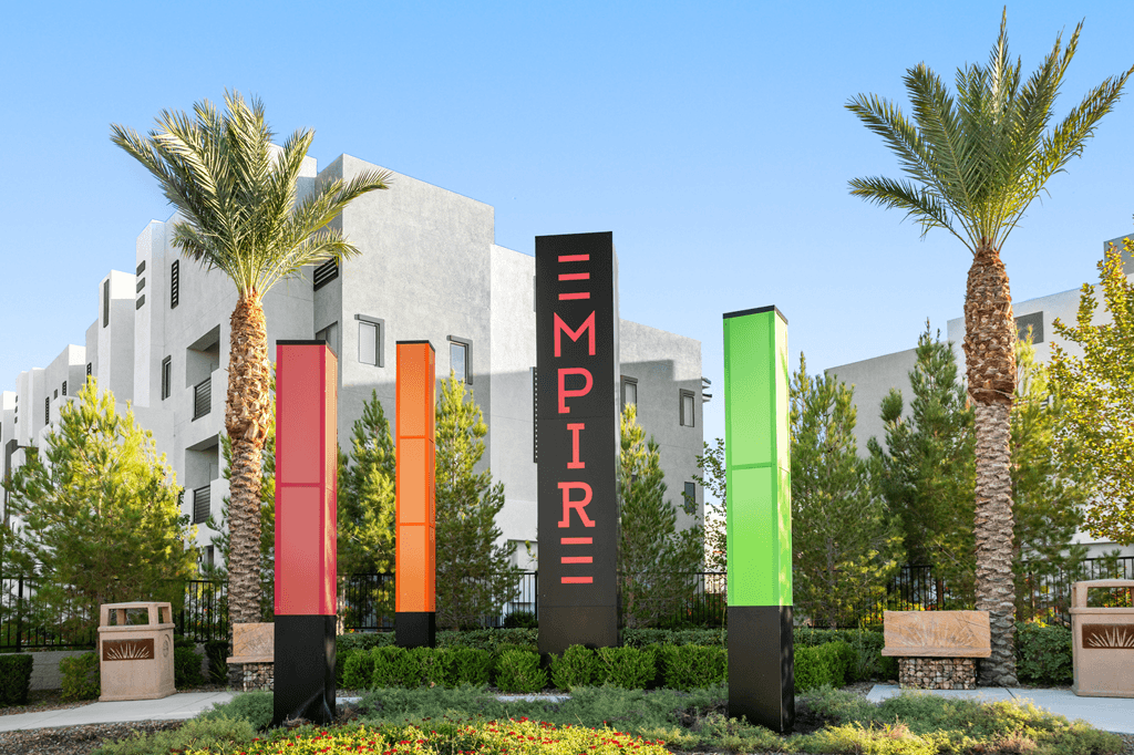 A sign that says Empirire is in front of a building.